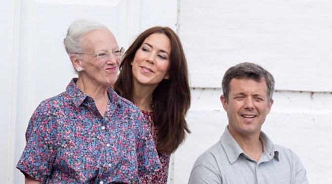 Members of the Danish Royal Family Witness the Changing of the Guard.